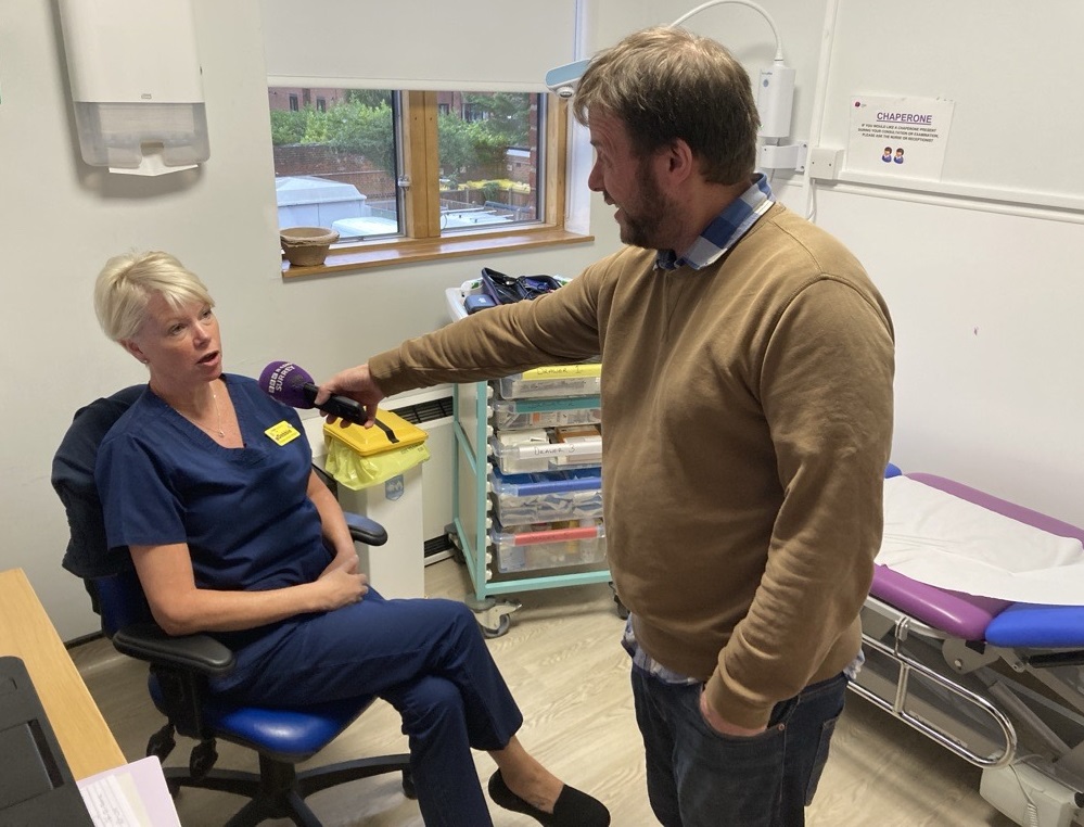 Photo of emergency nurse practitioner Debbie Chamberlain being interviewed at Woking Urgent Treatment Centre