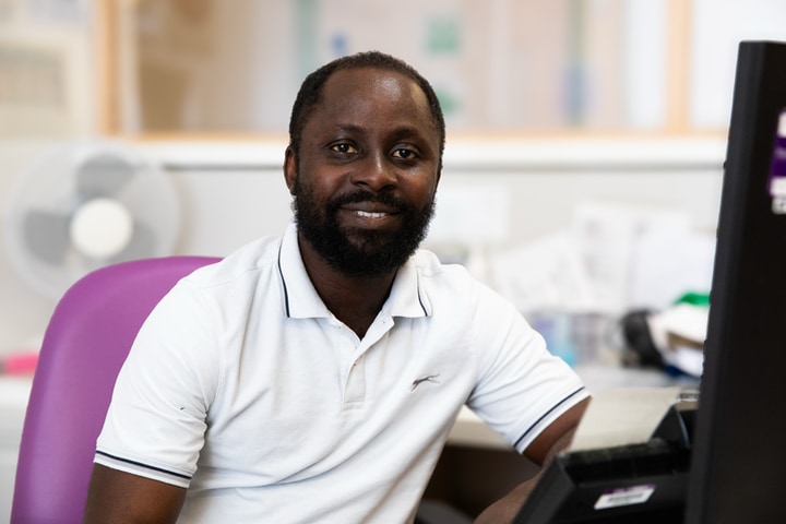 Staff member at his desk