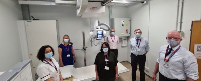 Staff members in an X-ray room