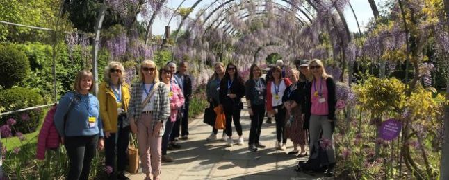 Group of people standing in front of RHS Garden Wisley